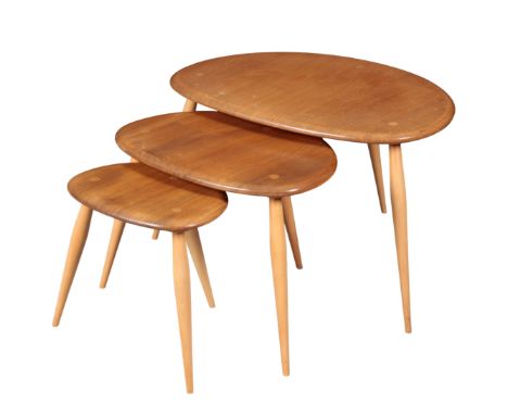 A NEST OF 3 ERCOL ELM 'PEBBLE' OCCASIONAL TABLES the largest 40cm high x 65cm wide x 44cm deep
