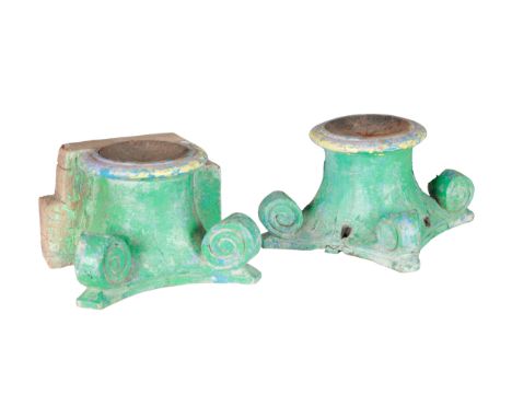 TWO SIMILAR GREEN-PAINTED PRICKET CANDLESTICKS both appear to have been converted form column capitals, one example previousl