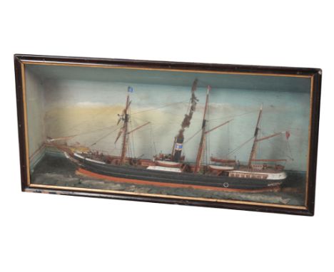 A LATE VICTORIAN DIORAMA DEPICTING A SCRATCH BUILT MODEL OF A STEAM SHIP 'ST ANNE' sailing on choppy seas, with members of th