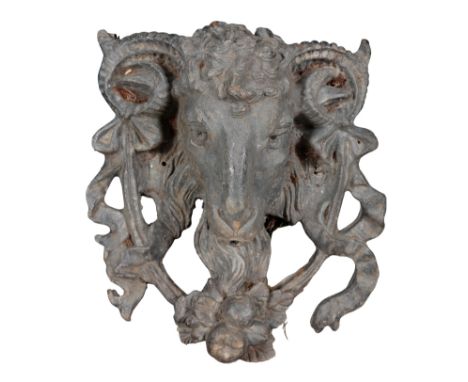 A LEAD FOUNTAIN HEAD in the form of a ram's head with curled horns and swags of drapery, 35cm high x 29cm wideProvenance: The