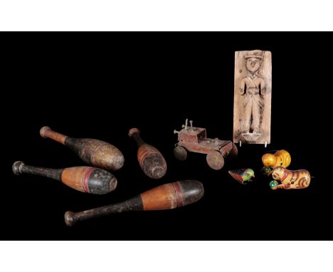 A GROUP OF THREE CLOCK WORK TINPLATE TOYS 20th century, including two cats and a bird, together with a carved wood soldier, 2