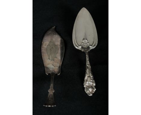 AN AMERICAN CAST SILVER CAKE SLICE of Art Nouveau design, the terminal modelled with female figure and Cupid, the blade of he