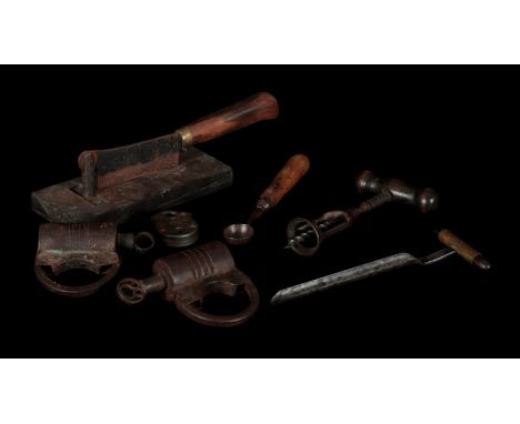 A SMALL GROUP OF TOOLS AND METALWARE including two 19th century padlocks, another padlock, a 19th century corkscrew, a corer,