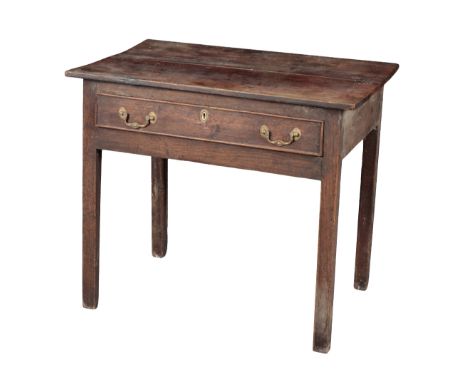 AN OAK SIDE TABLE 18th century, with a single frieze drawer, on block legs, 70cm high c 82cm wide x 56cm deepProvenance: The 