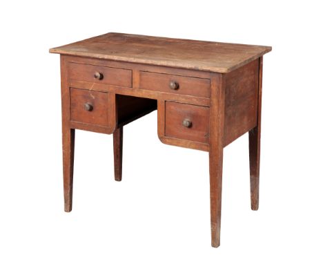 A STAINED PINE KNEEHOLE DRESSING TABLE 20th century, on tapering block legs, 76cm high x 84cm wide x 50cm deepProvenance: The