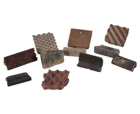 A GROUP OF ELEVEN PRINTING BLOCKS with various pattern stamps (11)Provenance: The Richard Pratley Collection of English Furni