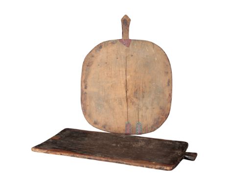 TWO RUSTIC BREAD BOARDS the largest 78cm x 37cm, the other, with an old repair,  66cm x 52cm (2)Provenance: The Richard Pratl