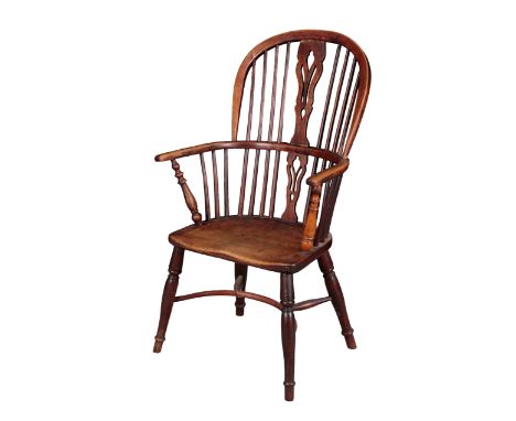 AN ASH AND ELM WINDSOR CHAIR 19th century, the hoop back with shaped and pierced splat, on turned legs joined by crinoline st