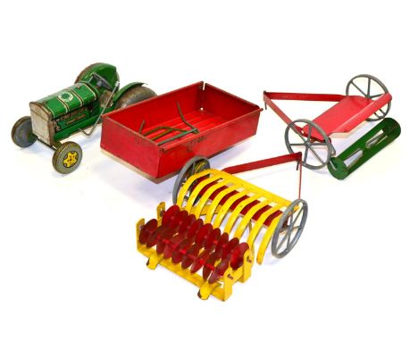 Mettoy Tractor Set consisting of c/w Tractor (lacking seat) trailer and three other implements (all F-G)