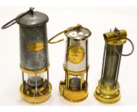 A Brass Davy Type Miners Lamp by Thomas & Williams, Aberdare, stamped '1951 E.T.& W 10', with suspension ring, together with 