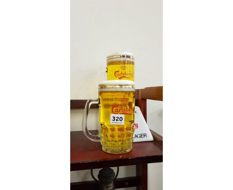 CARLSBERG COUNTER MOUNTED ITEM AND PINT GLASS