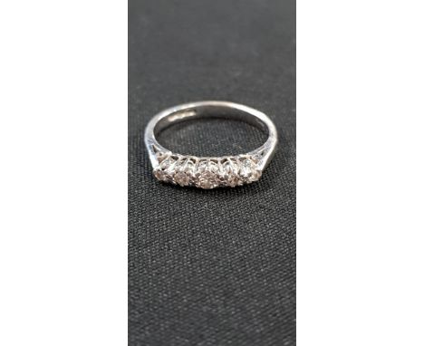 PLATINUM AND 5 STONE DIAMOND RING