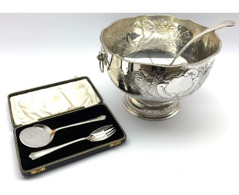 Plated punch bowl with embossed floral decoration, D31cm and a ladle together with a set of boxed Elkington plated servers Co
