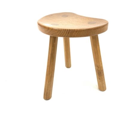 Robert 'Mouseman' Thompson of Kilburn Yorkshire oak three legged calf stool, with dished saddle seat, carved with mouse signa