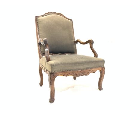 19th century French walnut armchair, carved cresting rail, upholstered seat and back panel, leaf carved open scrolled arms,ca