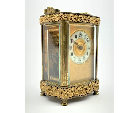 Early 20th century carriage clock with white dial inscribed 'Fattorini, Paris' in brass and bevelled glass case H12cm Conditi