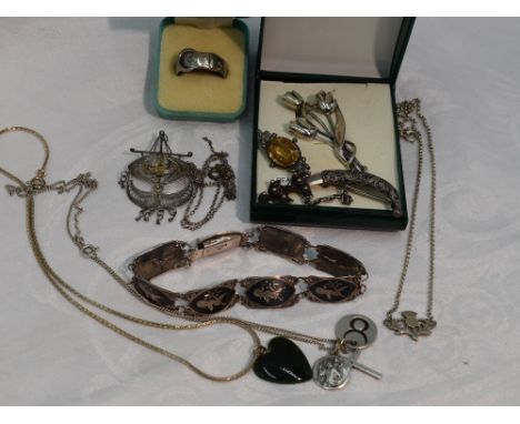 A selection of HM silver and white metal stamped silver including Scotch Thistle necklace, Oriental bracelet, brooches etc
