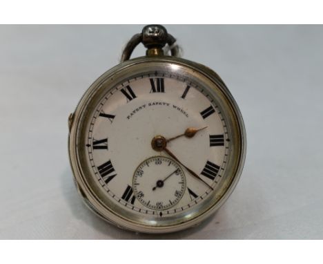 A silver key wound pocket watch by Scales of Kendal no: 9083 having a Roman numeral dial with subsidiary seconds in a silver 