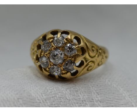 A Victorian 18ct gold signet ring having a diamond cushion cluster, approx 0.4ct to moulded shoulders on an 18ct gold loop, s