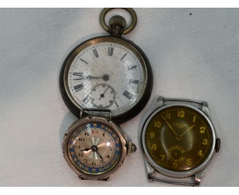 A white metal top wound pocket watch stamped 935 having Roman numeral dial with subsidiary seconds in plain case, a white met