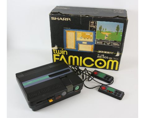 SHARP Twin Famicom Console (NTSC-J)Condition Report:  Complete, boxed, some cosmetic damage to box, untested