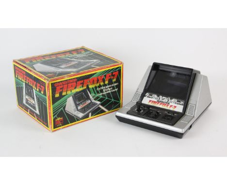 GRANDSTAND Firefox F-7 Games ConsoleCondition Report:  Item is complete, boxed and untested.