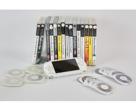 PLAYSTATION PSP Console (White) An assortment of PSP Games + 1 UMD Movie (PAL)Includes: 15 boxed games and 14 loose UMDsHighl