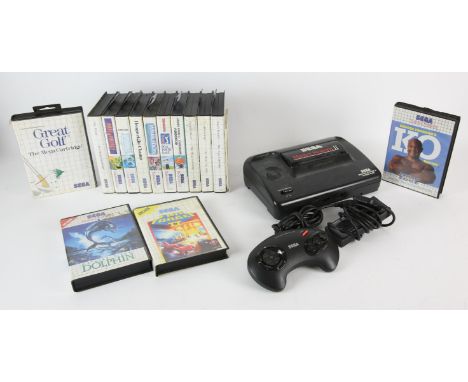 SEGA bundle. A Sega Master System II console with one controller and 13 games including The Ninja, Ecco the Dolphin, James Po