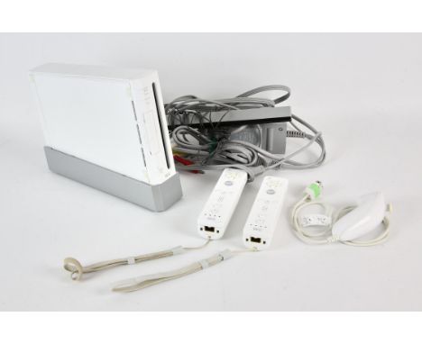 NINTENDO Wii Console + accessories Accessories include: Nunchuk (x1) and Wii Remote (x2)Condition Report:  Item is untested, 