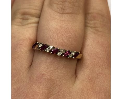 18CT GOLD RUBY AND DIAMOND CHANNEL SET RING SIZE O/P 2.8G APPROX