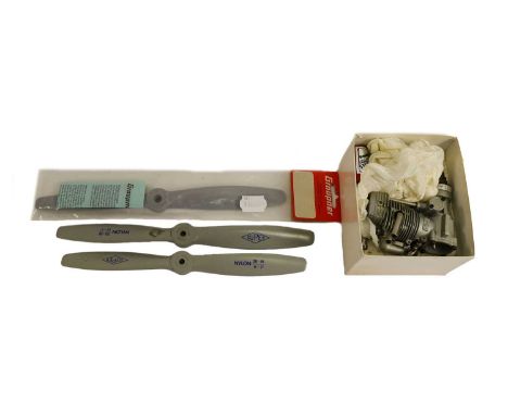 (unused, in original box with leaflet) together with three model aircraft propellers (4)
