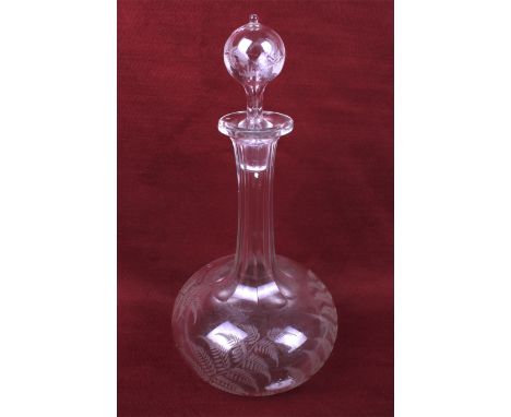 A Victorian Fernware glass decanter. With wheel cut decoration in the form of ferns to the sides and stopper, H28cm