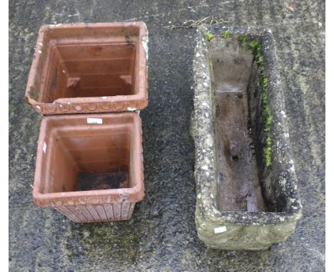 Three assorted garden pots. Including a reconstituted stone trough planter and two terracotta square planters. Max. H28cm