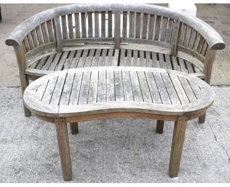 Hardwood curved garden bench and matching table. Bench L165cm x D60cm x H85cm