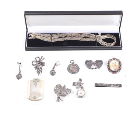 A collection of silver jewellery. To include a tri-colour silver braided three strand necklace and matching bracelet; a twin-