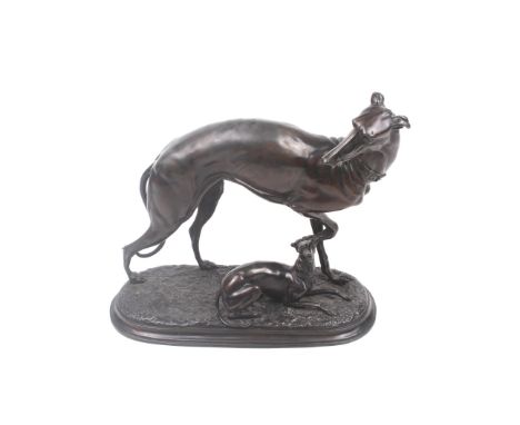 A bronzed figural group after P J Mene of a greyhound watching over her pup. Unsigned, H26cm Condition Report: Overall in goo