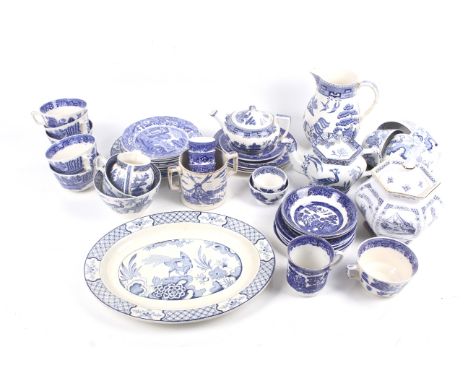 An assortment of 19th century and later blue and white transfer tea sets. Including Wedgwood 'Willow' pattern, Wood & Sons 'Y