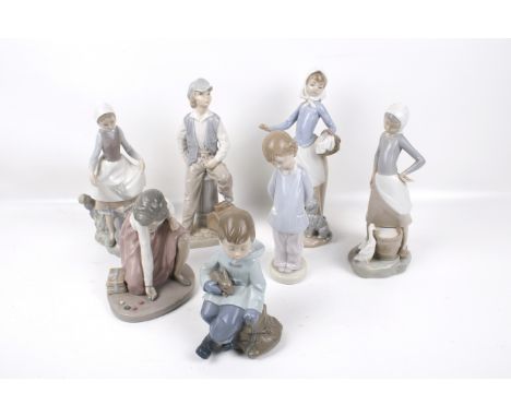 Seven contemporary Nao porcelain figures. Including one modelled as a girl holding a basket, a man leaning on a plinth, etc. 