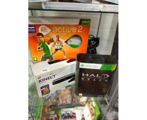 Shelf of Xbox 360 kinnect boxed together with Xbox boxed halo reach item etc . 