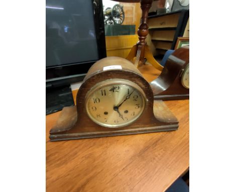 2 hole art deco clock with pendulum. 