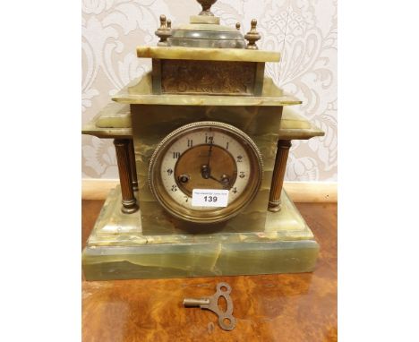Antique Victorian onyx slate mantle clock with key and pendulum. 