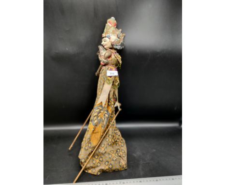 Early eastern puppet . 