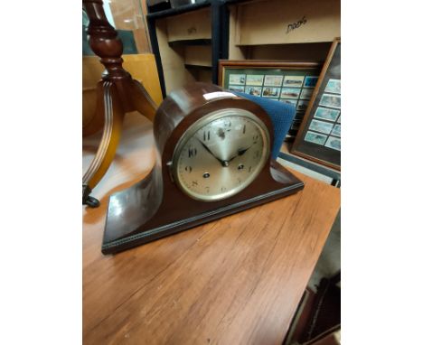 2 hole art deco clock with pendulum. 