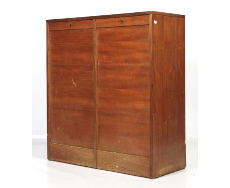 A 1960s teak roll front filing cabinet. With shallow moving trays in the left compartment and one shelf in the right. L89cm x