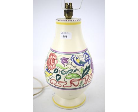 A mid-century Poole pottery table lamp. Of baluster form, stamped Poole England mark to underside with artists signature, H33