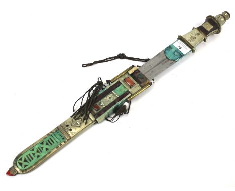 A white metal and stone set ceremonial knife. With turquoise stained lather and stone set scabbard, with leather tassels, 46c