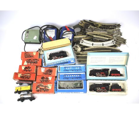 An assortment of model railway related items. To include a Marklin 3003 locomotive, Marklin 3031 tank engine locomotive, both