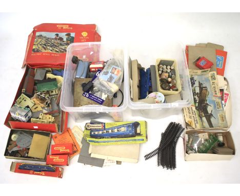 A collection of vintage model railway related items. To include scenery, buildings, a Tria-ang electric train, track, paints,
