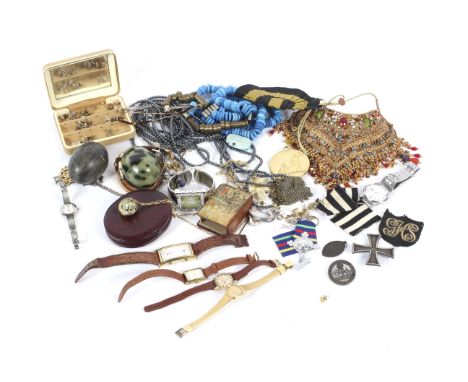 An assortment of jewellery and watches. To include a yellow metal cased vintage Longines wristwatch, yellow metal bar brooch,