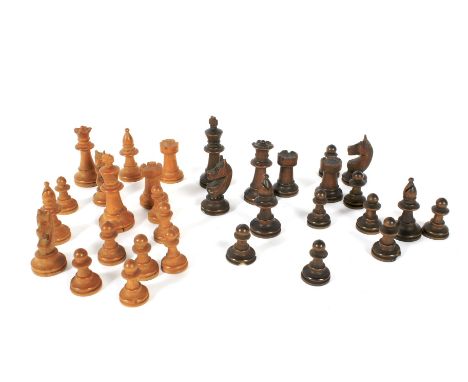 An early 20th century carved wooden chess set. 